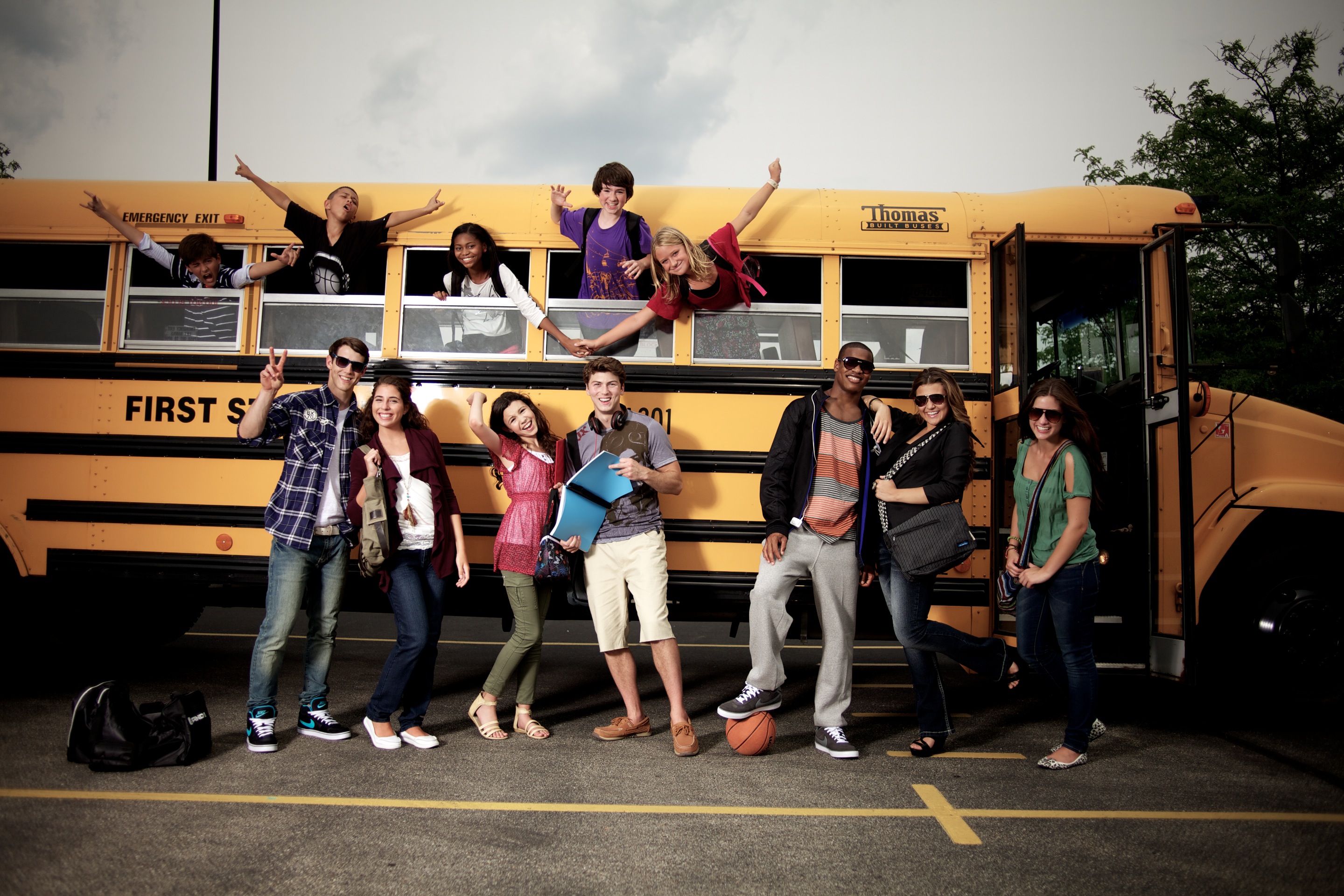 photograph of students with a school bus, back to school retail fashion photography by travis neely