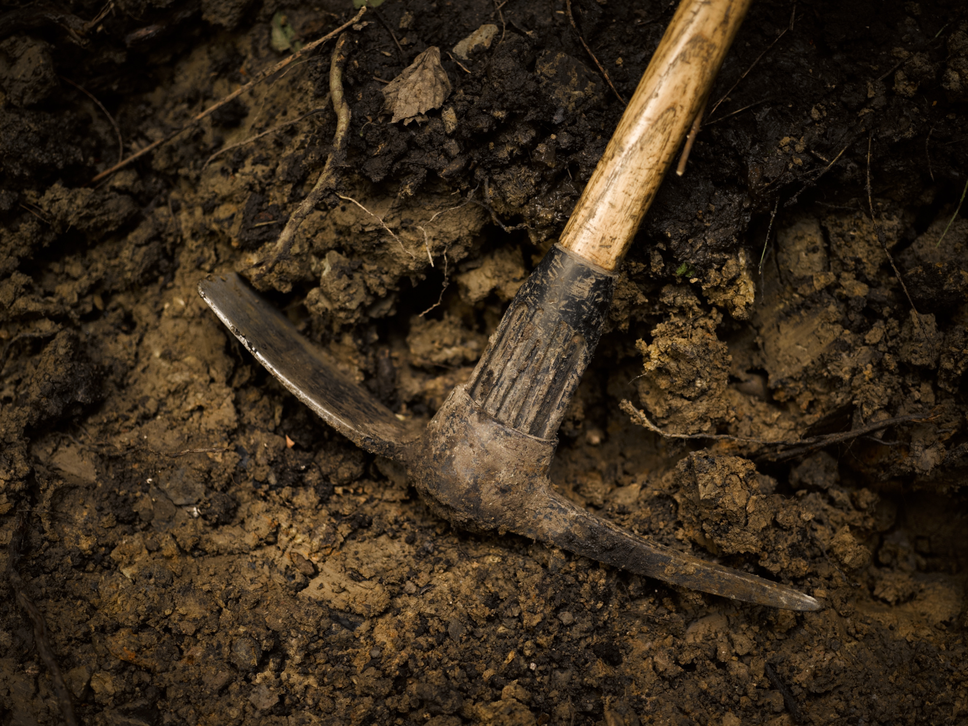 photograph of a pick axe on hiking trail